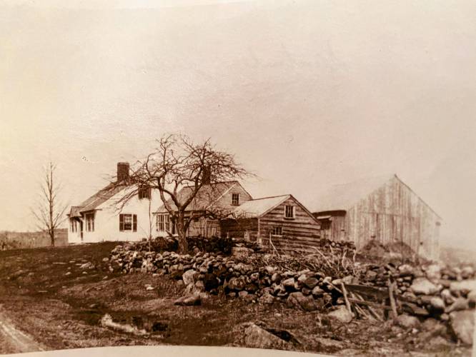 A 1930 photo of Sugarwood showing the previous barn and outbuildings. 